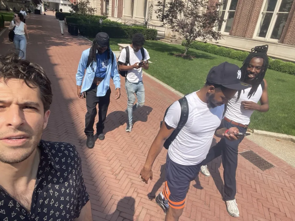 A group selfie of five men