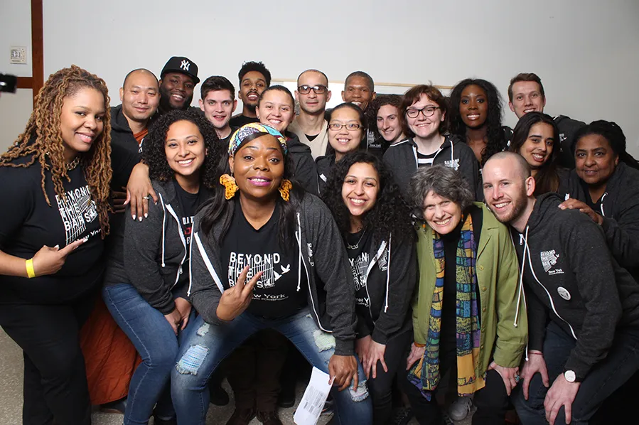 Group photo of people in black shirts
