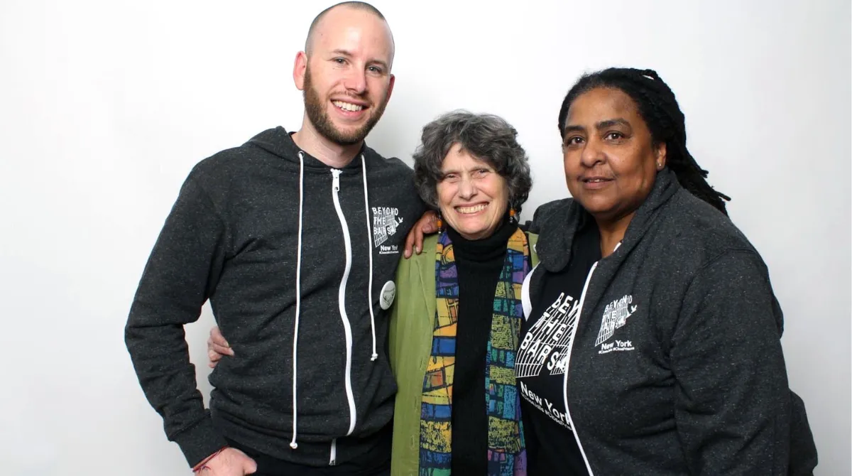 Kathy Boudin posing for a photo with Cameron Rasmussen and Cheryl Wilkins