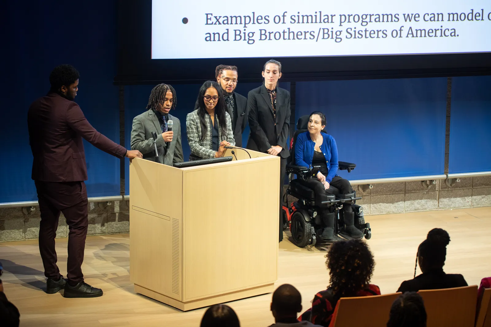 Group of JAYC graduates presenting their policy proposal