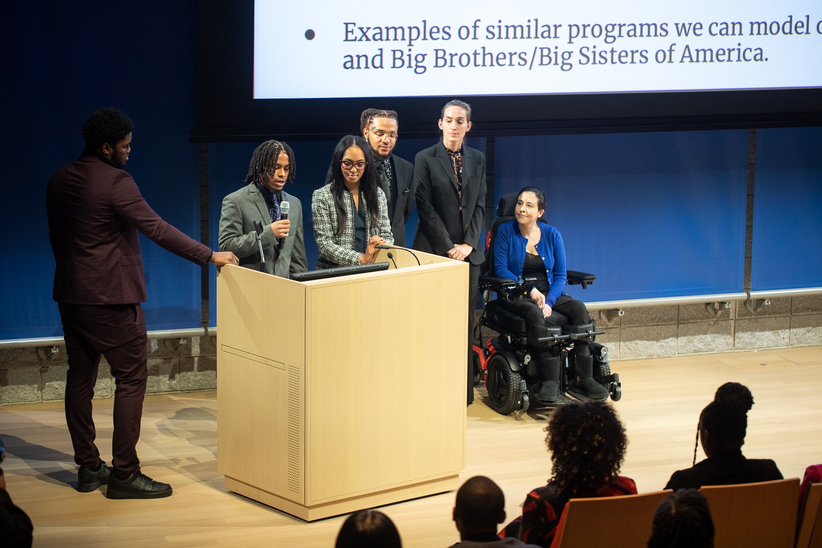 Group of JAYC graduates presenting their policy proposal