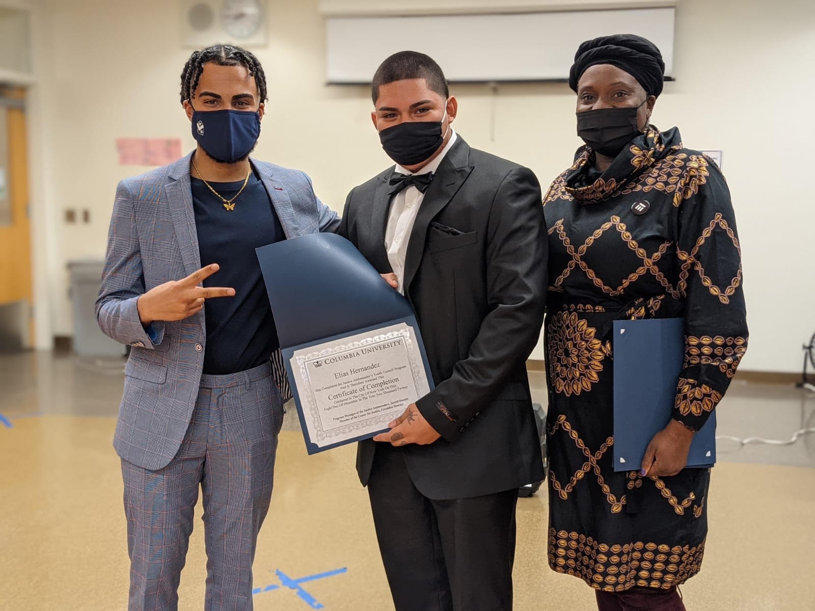 JAYC participants pose with certificate of program completion 