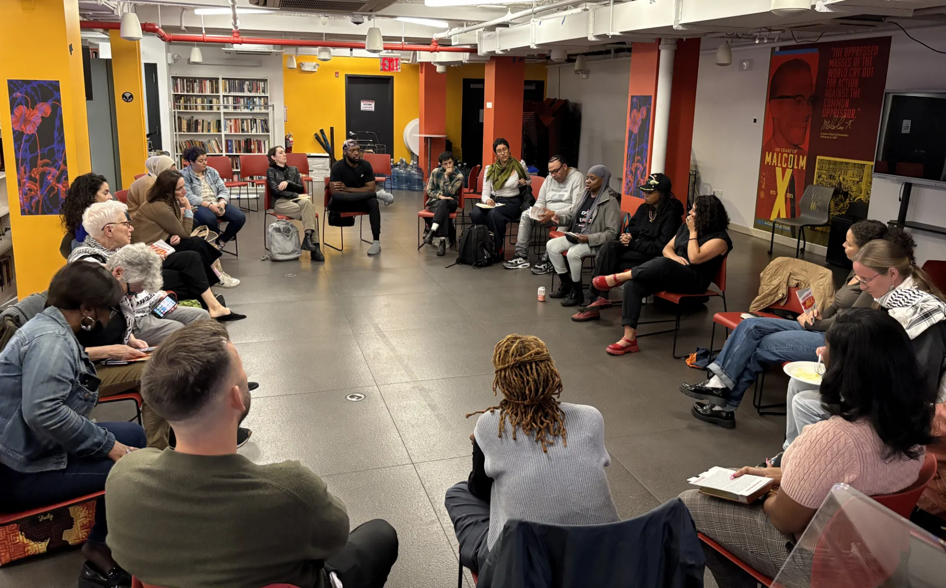 A group of people sitting in a circle